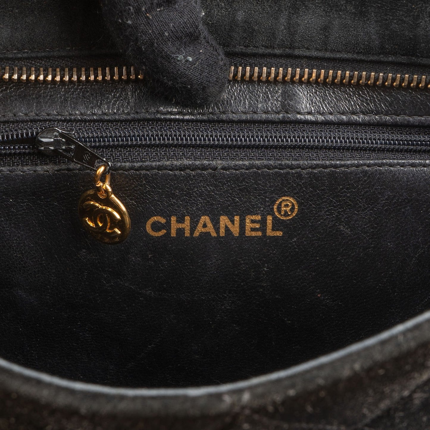 Chanel Quilted Suede Medallion Handbag