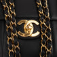 Chanel Vertical Quilted Lambskin 24K Gold Jumbo Single Flap Crossbody Bag