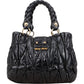 Miu Miu Quilted Leather Small City Handbag