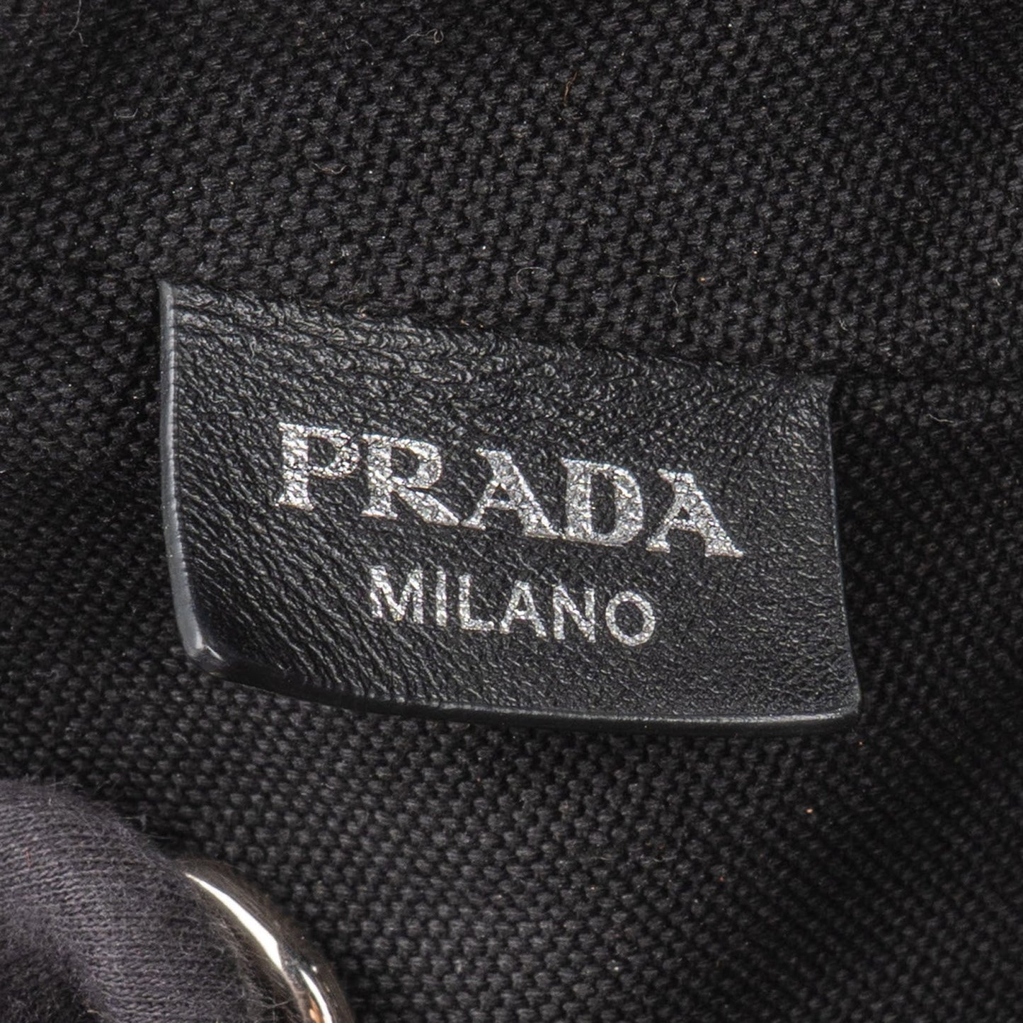 Prada Triangle Perforated Grommet Canapa Handbag