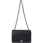 Chanel Quilted Lambskin Jumbo Double Flap Crossbody Bag