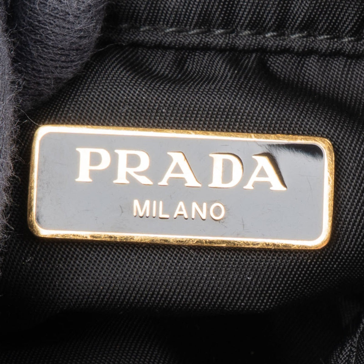 Prada Quilted Re-Nylon Triangle Mini Pouch Crossbody Bag