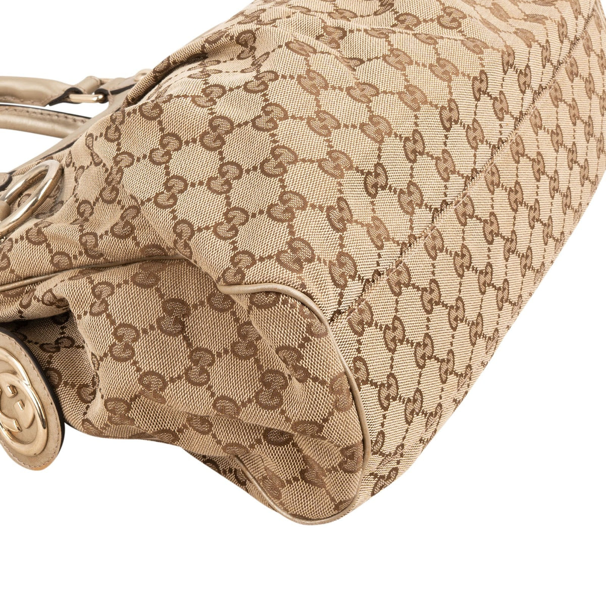 Gucci Monogram GG Canvas Metallic Leather Sukey Handbag