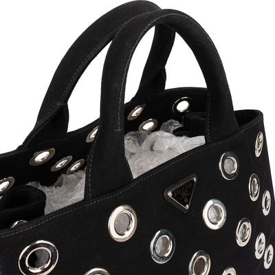 Prada Triangle Perforated Grommet Canapa Handbag