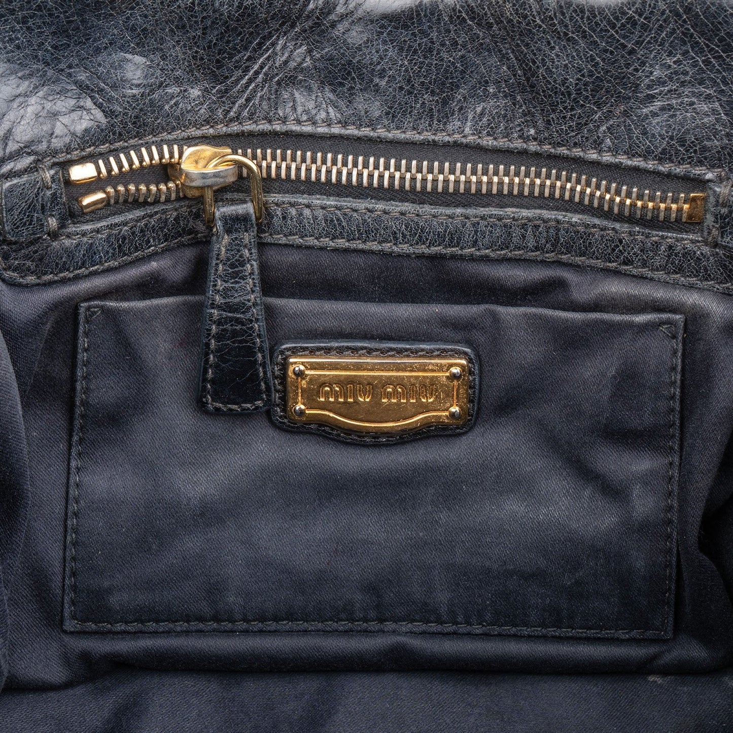 Miu Miu Quilted Leather Small City Handbag