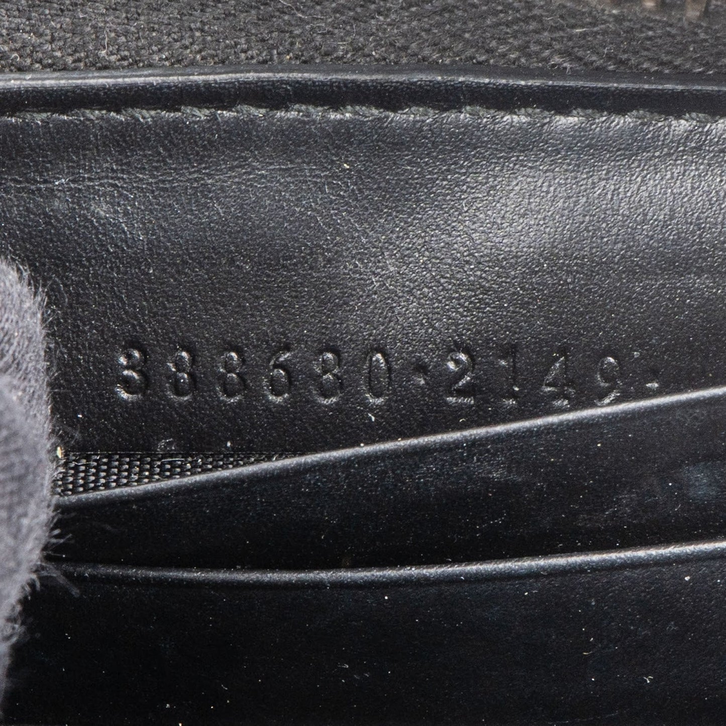Gucci Guccissima Leather Bow Zip Around Wallet