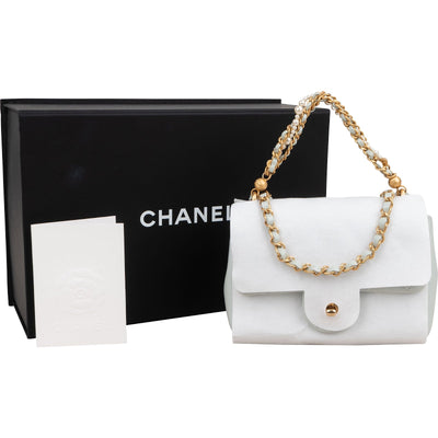 Chanel Quilted Lambskin Mini Single Flap Pearl Handle Crossbody Bag