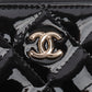 Chanel Quilted Patent Leather CC Clutch