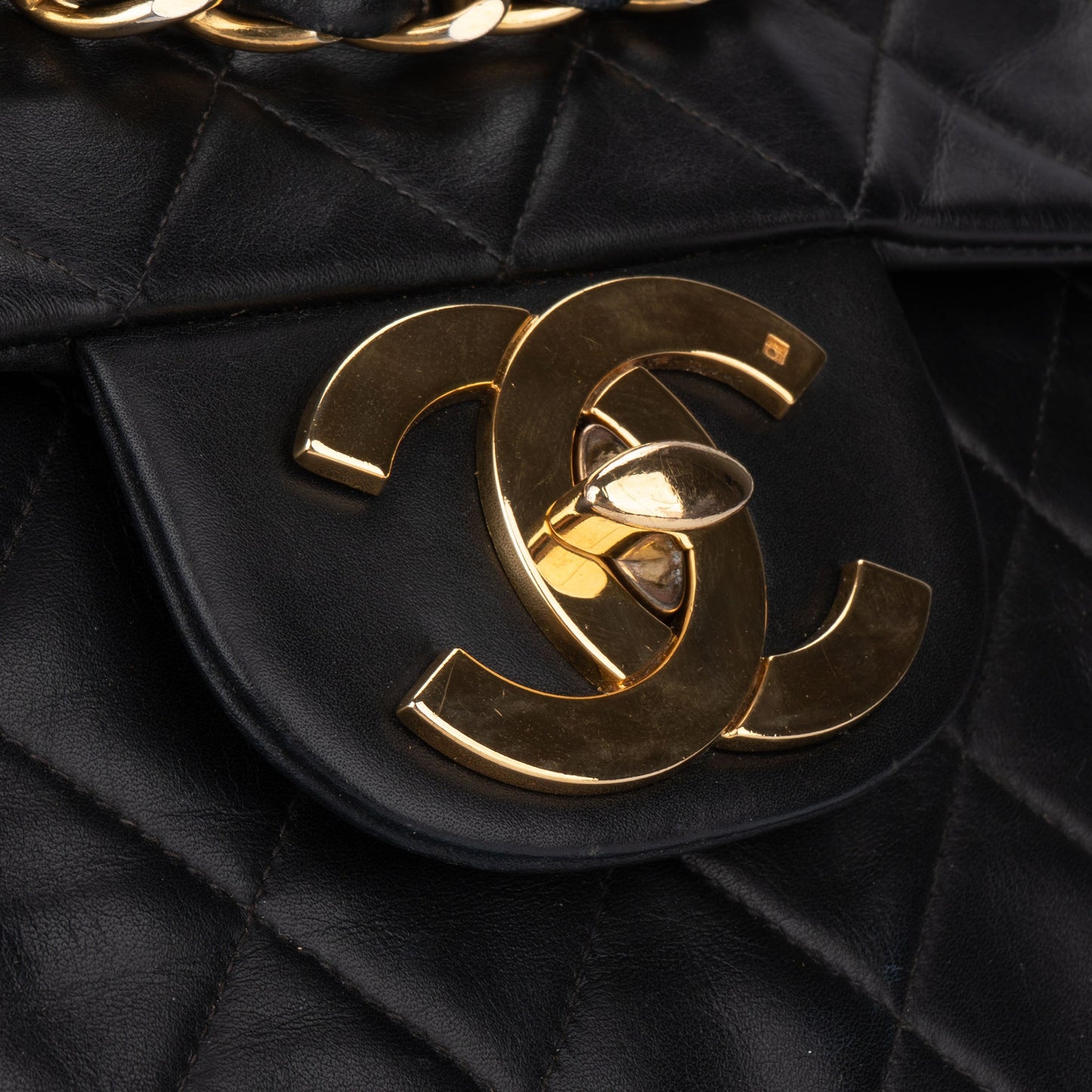 Chanel Quilted Lambskin 24K Gold Maxi Single Flap Crossbody Bag