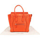 Céline Orange Grained Leather Luggage Handbag